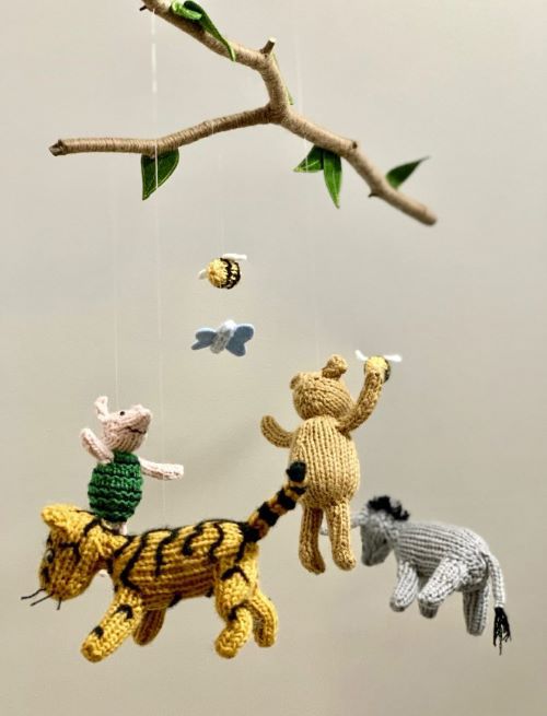 mobile with knit Winnie the Pooh characters