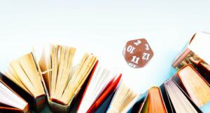 Image of a d20 with a pile of books