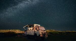 Image of a camper under the stars