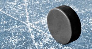 Image of a hockey puck on ice