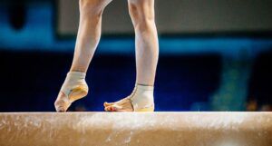 Image of gymnast on balance beam