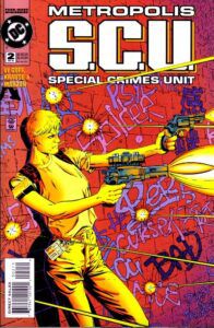 The cover of Metropolis S.C.U. #2. Maggie stands with her back against a brick wall that is covered in graffiti. She is glaring, smoking a cigarette, and firing a gun in each hand while being shot at.