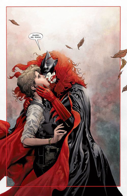 A splash page from Batwoman #17. Batwoman, in full costume, kisses a startled Maggie, in uniform and bulletproof vest.

Batwoman: Marry me, Mags.
