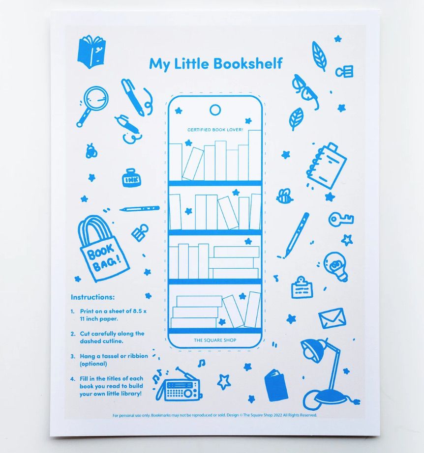 Image of a white and blue bookmark that allows you to fill in the books currently on your shelf. 