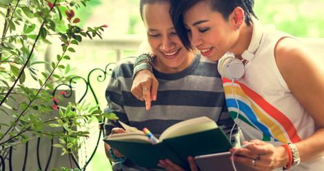 female sapphic couple reading together lgbtq cool rainbow shirt 470x248